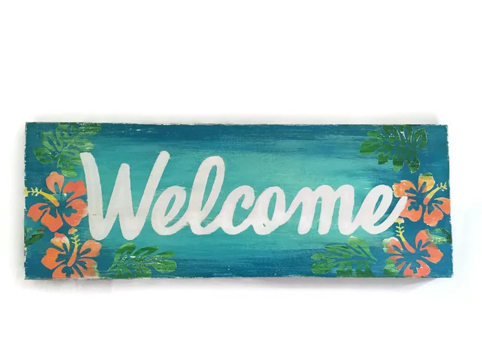 Tropical Welcome Sign with Colorful Hibiscus Flowers