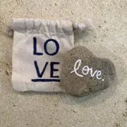 Hand Written Love on Heart Shaped Bach Stone
